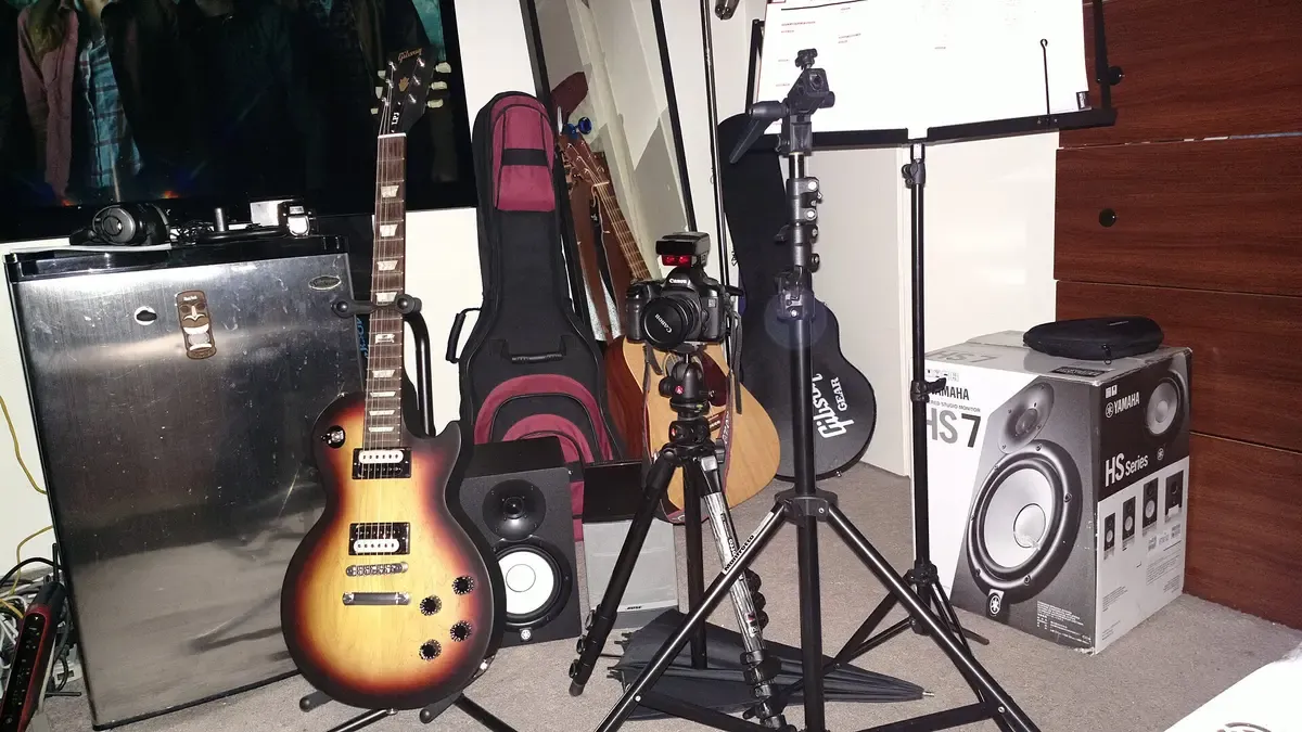 Before: cluttered music corner (original photo)